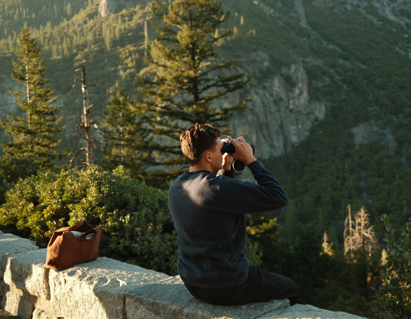 Peter at a Yosemite overlook with binoculars